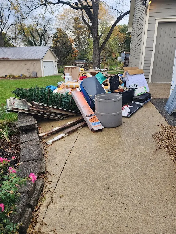 Dumpster being loaded with debris for Demolition Dumpster Rental in Sierra Vista Southeast